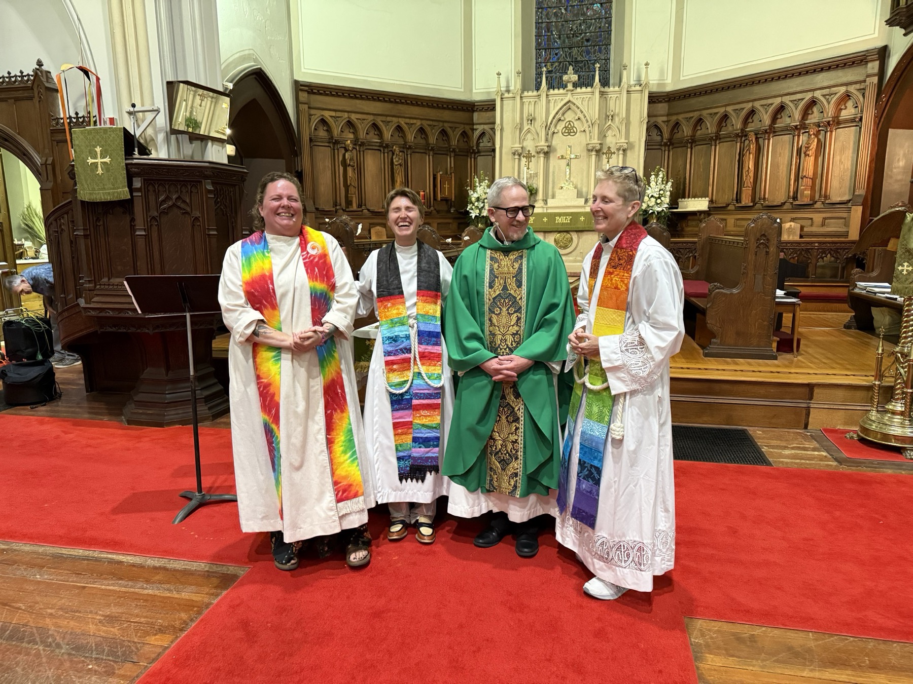 Clergy and community leaders gather for a Fall River Pride service.