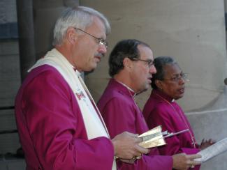 Episcopal bishops Bud Cederholm, Tom Shaw, SSJE and Barbara C. Harris at Iraq War Vivil 2002