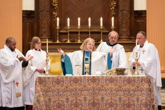 Bishop Julia Whitworth celebrating Holy Eucharist at 2025 Absalom Jones service