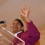 Bishop Gayle Harris acknowledges applause from Diocesan Convention.