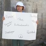 Vivian Ruiz with justice march sign